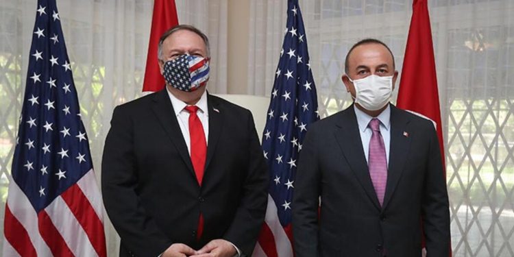 تشاوش أوغلو: جو بايدن “جاهل” يتجاوز الحدود