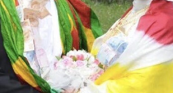 تركيا: اعتقال عريس كردي لارتدائه وشاحًا يحمل ألوان علم “روج آفا”