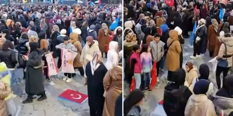 سيدة تسجد على علم تركيا في مؤتمر أردوغان!